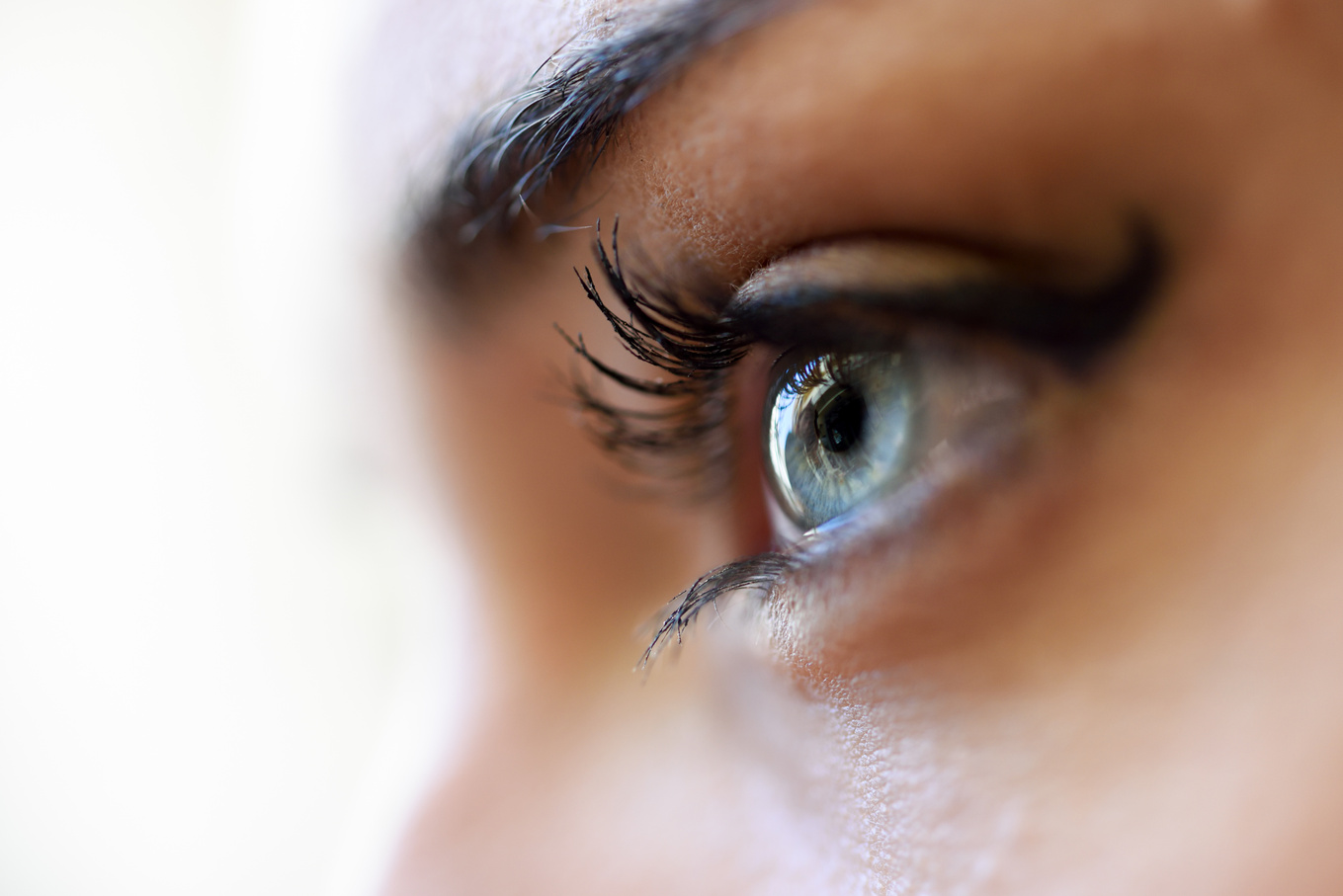 Woman Blue Eyes with Long Eyelashes