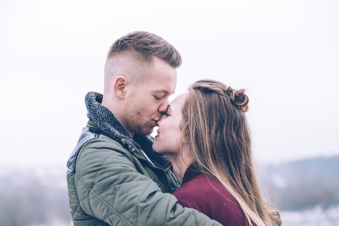 Woman Kissing Outdoors